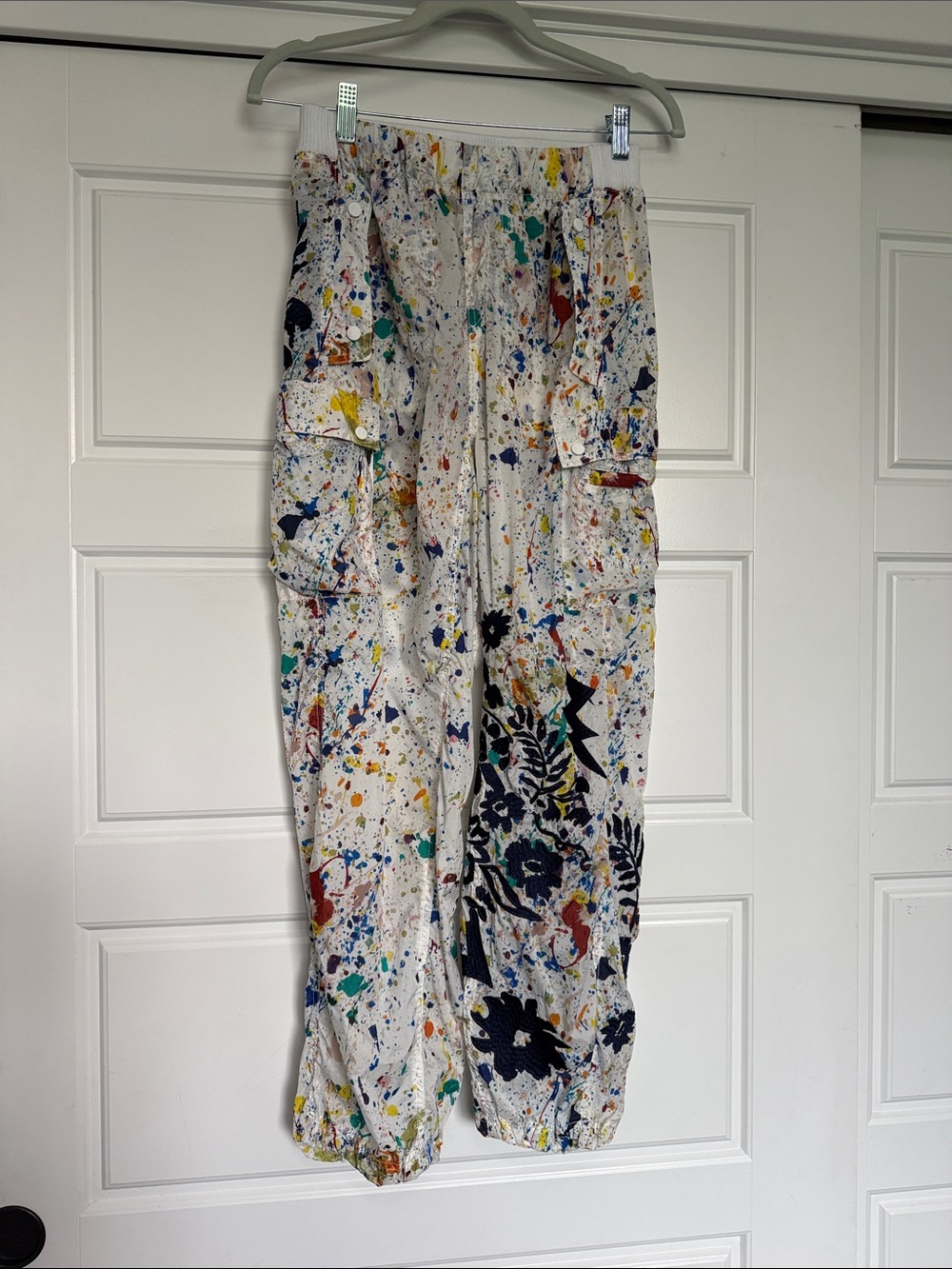 Free people movement  Xs NWOT. Hike pants in Pacific Highway spider paint.